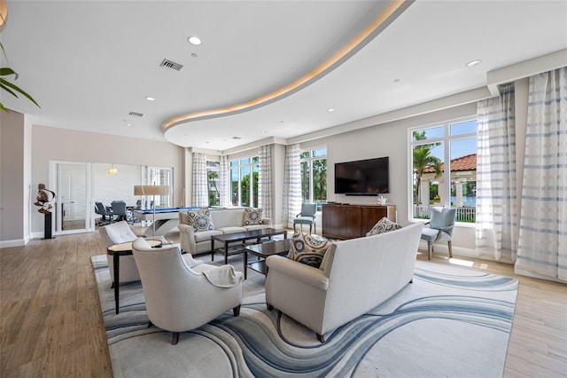 1325 Snell Isle Blvd NE Unit 810, Saint Petersburg, FL 33704 - living room with light wood-style floors, recessed lighting, and baseboards