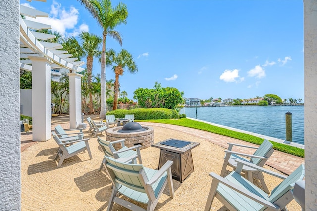 1325 Snell Isle Blvd NE Unit 810, Saint Petersburg, FL 33704 - view of patio / terrace with a fire pit and a water view