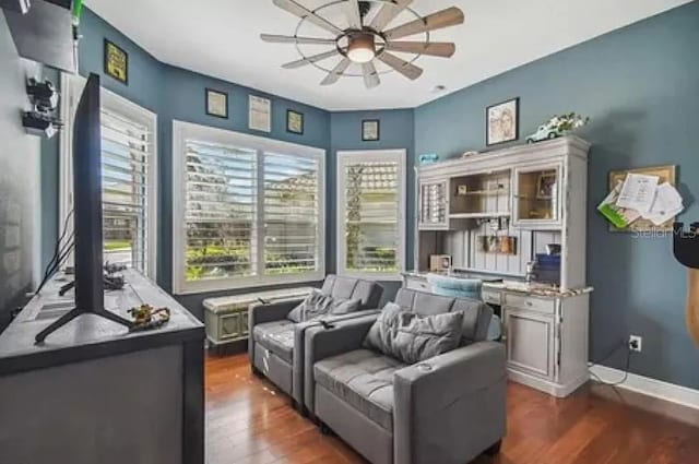 21513 Belvedere Ln, Estero, FL 33928 - sitting room featuring a ceiling fan, plenty of natural light, and wood finished floors