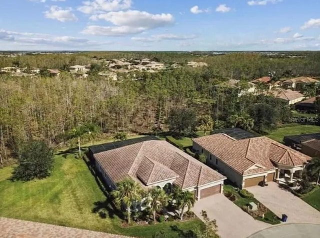 21513 Belvedere Ln, Estero, FL 33928 - aerial view of property and surrounding area with a forest