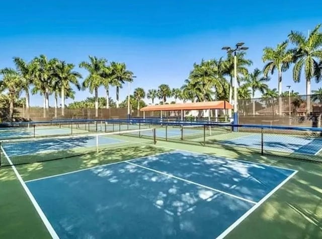 21513 Belvedere Ln, Estero, FL 33928 - view of tennis court featuring fence