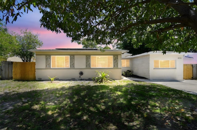 5010 8th Ave N, Saint Petersburg, FL 33710 - single story home featuring solar panels and stucco siding
