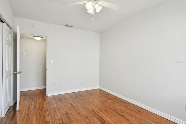 5010 8th Ave N, Saint Petersburg, FL 33710 - unfurnished room with a ceiling fan, baseboards, and wood-type flooring