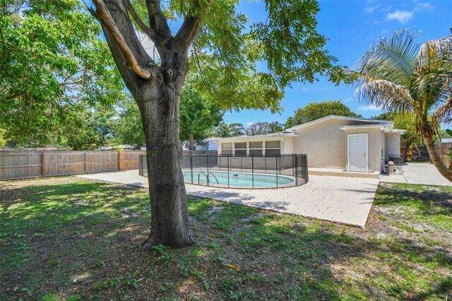 5010 8th Ave N, Saint Petersburg, FL 33710 - fenced backyard featuring a patio