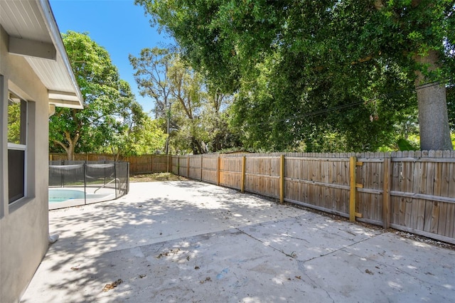 5010 8th Ave N, Saint Petersburg, FL 33710 - fenced backyard featuring a patio