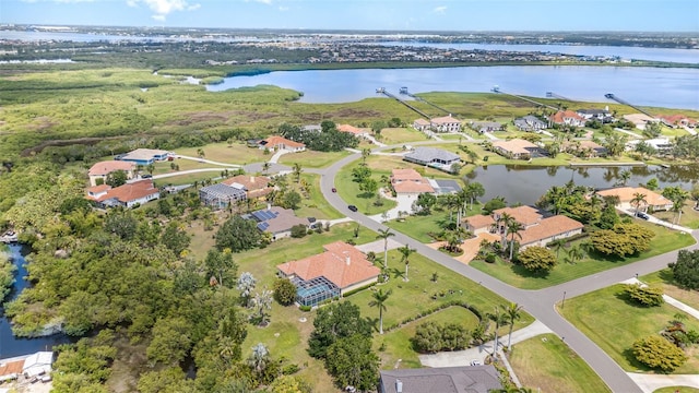 6120 9th Avenue Cir NE, Bradenton, FL 34212 - aerial overview of property's location with a large body of water and nearby suburban area
