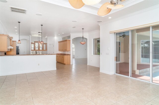 6120 9th Avenue Cir NE, Bradenton, FL 34212 - unfurnished living room with crown molding, ceiling fan, arched walkways, recessed lighting, and light tile patterned flooring