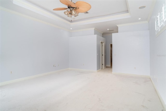 6120 9th Avenue Cir NE, Bradenton, FL 34212 - carpeted spare room with crown molding, a ceiling fan, a tray ceiling, baseboards, and recessed lighting