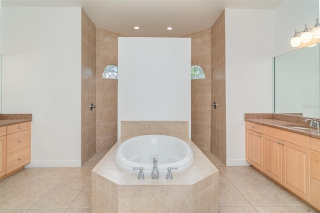 6120 9th Avenue Cir NE, Bradenton, FL 34212 - full bathroom with a bath, vanity, tile patterned flooring, recessed lighting, and baseboards