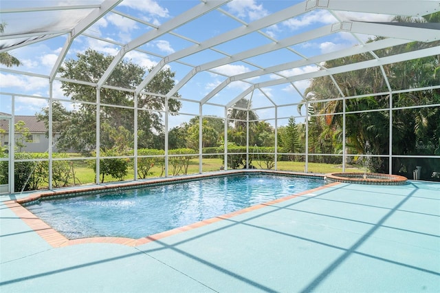 6120 9th Avenue Cir NE, Bradenton, FL 34212 - view of swimming pool with a patio, a pool with connected hot tub, and a lanai
