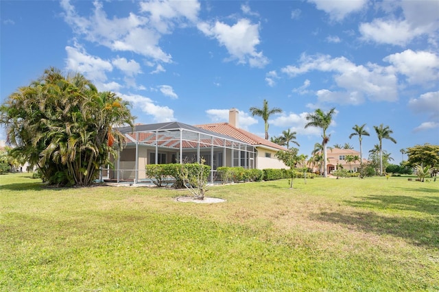 6120 9th Avenue Cir NE, Bradenton, FL 34212 - view of grassy yard with a lanai