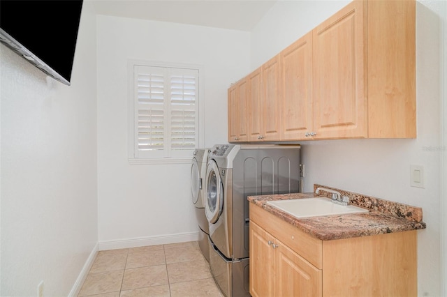 6120 9th Avenue Cir NE, Bradenton, FL 34212 - laundry room featuring washer and dryer, cabinet space, light tile patterned flooring, and baseboards