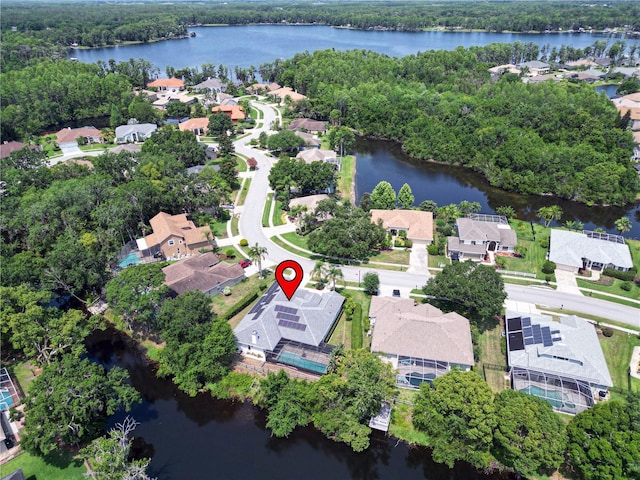 21215 Preservation Dr, Land O Lakes, FL 34639 - aerial view of property and surrounding area featuring a nearby body of water and nearby suburban area