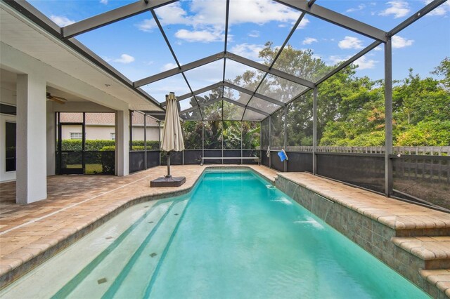 21215 Preservation Dr, Land O Lakes, FL 34639 - view of pool featuring a patio area, a lanai, and a ceiling fan