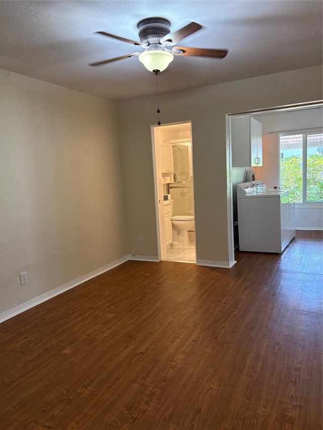 4152 56th Way N Unit 513, Kenneth City, FL 33709 - empty room with washer / clothes dryer, ceiling fan, and dark wood-style flooring