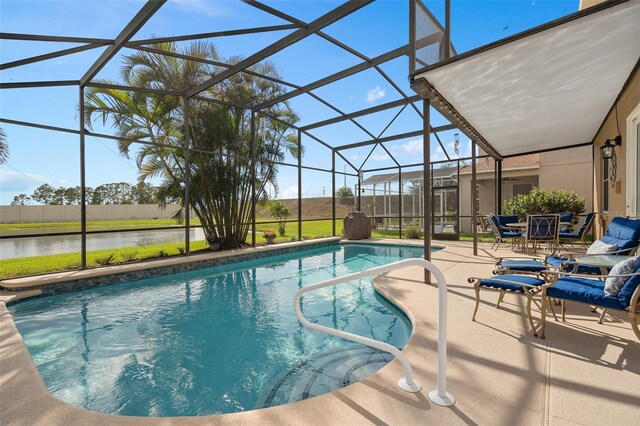 460 Tess Ct, Orlando, FL 32824 - outdoor pool featuring a patio and glass enclosure