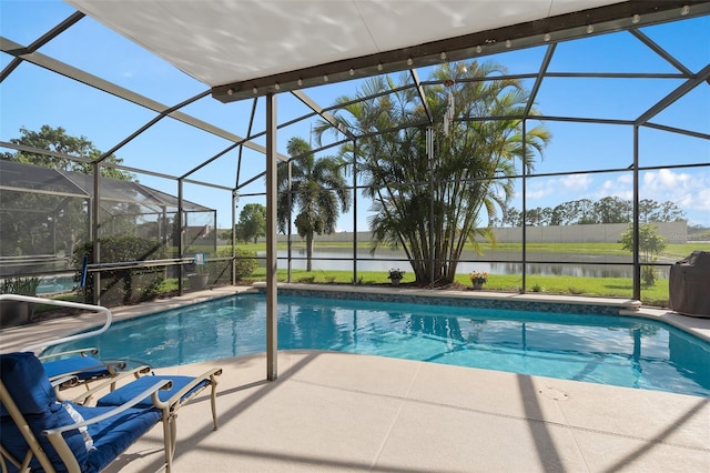 460 Tess Ct, Orlando, FL 32824 - swimming pool featuring a water view, a patio area, and glass enclosure
