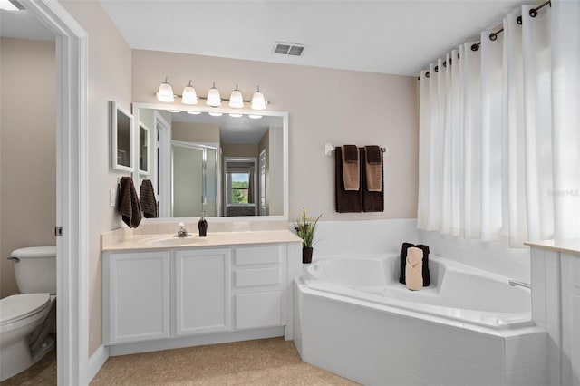 460 Tess Ct, Orlando, FL 32824 - bathroom featuring a stall shower, toilet, vanity, and a bath
