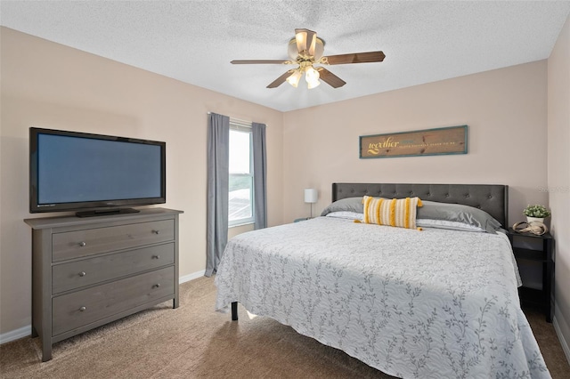 460 Tess Ct, Orlando, FL 32824 - bedroom with carpet floors, baseboards, ceiling fan, and a textured ceiling