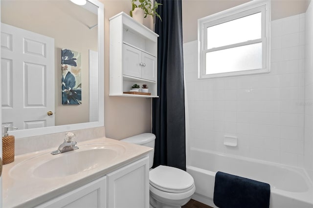 460 Tess Ct, Orlando, FL 32824 - full bathroom featuring toilet, shower / bath combo, and vanity