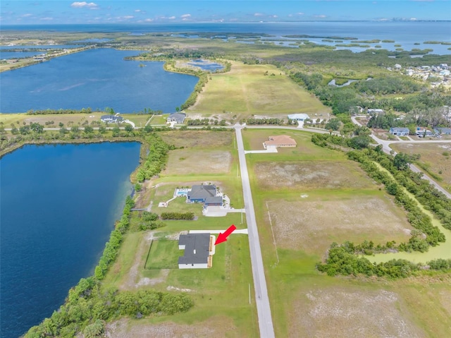 aerial overview of property's location with a large body of water