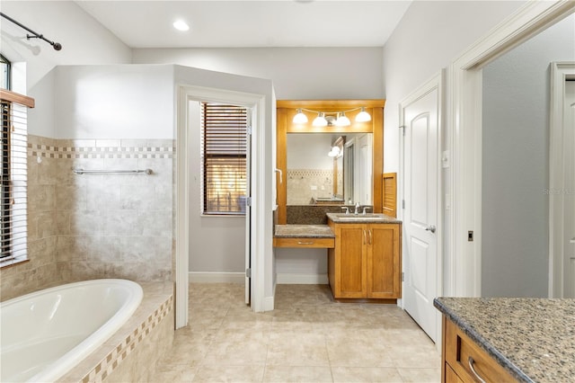 15104 Azra Dr, Odessa, FL 33556 - bathroom with healthy amount of natural light, a bath, vanity, and tile patterned flooring