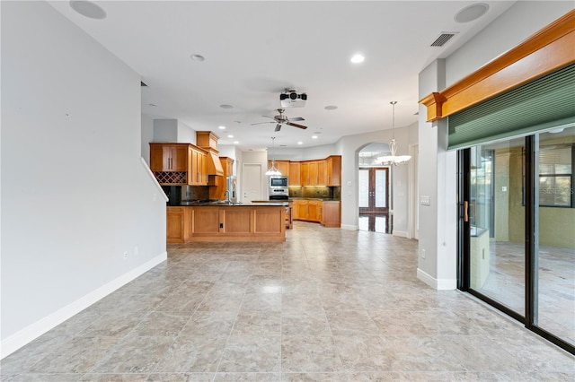 15104 Azra Dr, Odessa, FL 33556 - unfurnished living room featuring a chandelier, baseboards, recessed lighting, and ceiling fan