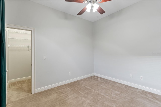 15104 Azra Dr, Odessa, FL 33556 - empty room featuring carpet, a ceiling fan, baseboards, and vaulted ceiling