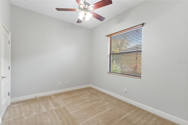 15104 Azra Dr, Odessa, FL 33556 - empty room featuring light colored carpet, baseboards, and ceiling fan