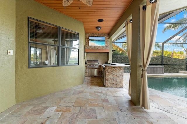 15104 Azra Dr, Odessa, FL 33556 - view of patio featuring area for grilling, a grill, a lanai, and a sink