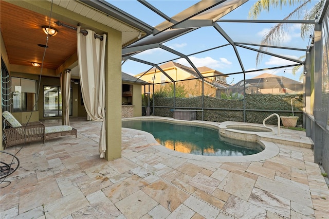 15104 Azra Dr, Odessa, FL 33556 - view of pool with a patio area, glass enclosure, and a pool with connected hot tub