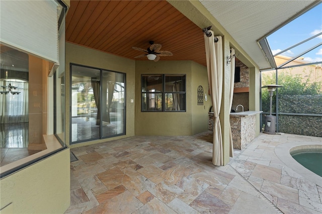 15104 Azra Dr, Odessa, FL 33556 - unfurnished sunroom with ceiling fan