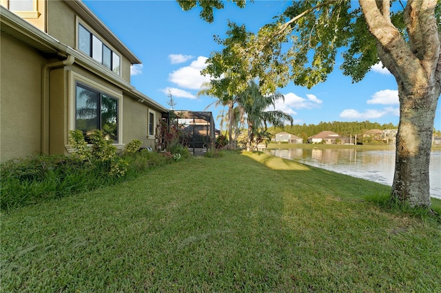 15104 Azra Dr, Odessa, FL 33556 - view of green lawn featuring a water view and glass enclosure
