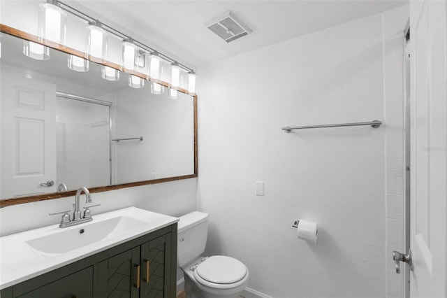 2500 Winding Creek Blvd Unit A104, Clearwater, FL 33761 - bathroom with toilet, baseboards, and vanity