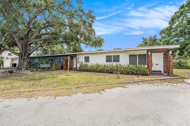 5250 12th St N, Saint Petersburg, FL 33703 - single story home featuring a front lawn