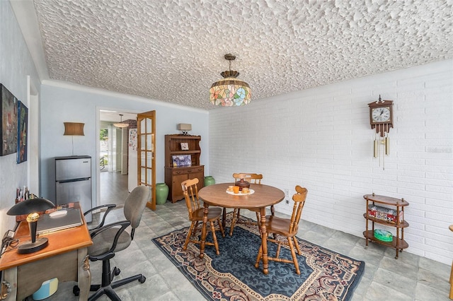 5250 12th St N, Saint Petersburg, FL 33703 - dining area with brick wall