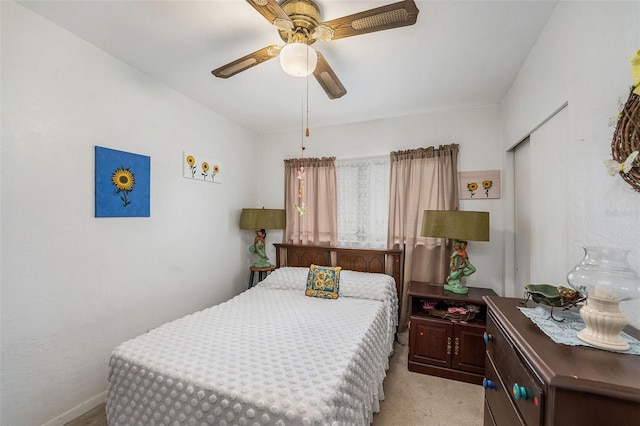 5250 12th St N, Saint Petersburg, FL 33703 - bedroom with light colored carpet and ceiling fan