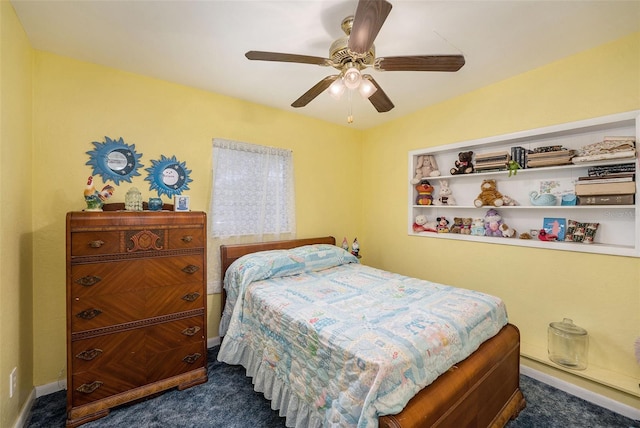 5250 12th St N, Saint Petersburg, FL 33703 - bedroom featuring dark carpet, ceiling fan, and baseboards