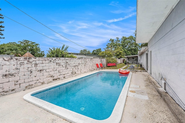 5250 12th St N, Saint Petersburg, FL 33703 - view of pool featuring a fenced backyard