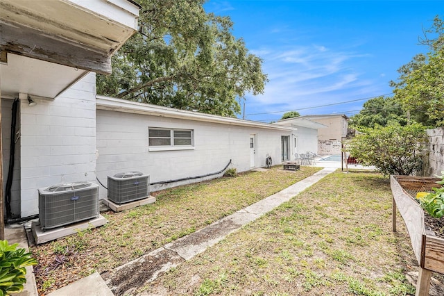 5250 12th St N, Saint Petersburg, FL 33703 - view of yard featuring central air condition unit