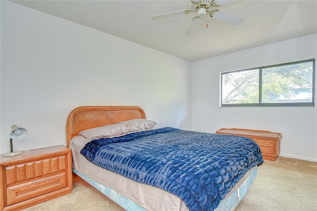 4911 Country Aire Ln, Tampa, FL 33624 - bedroom featuring carpet, baseboards, and ceiling fan