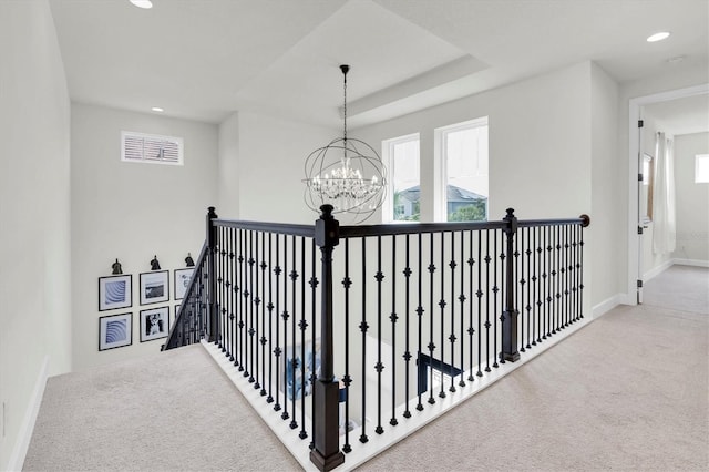 3850 Bonfire Dr, Odessa, FL 33556 - hall with an upstairs landing, carpet flooring, a chandelier, baseboards, and recessed lighting