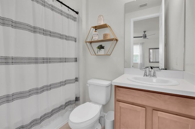 3850 Bonfire Dr, Odessa, FL 33556 - bathroom with ceiling fan, toilet, and vanity