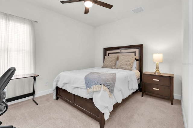 3850 Bonfire Dr, Odessa, FL 33556 - bedroom featuring light carpet, baseboards, and ceiling fan