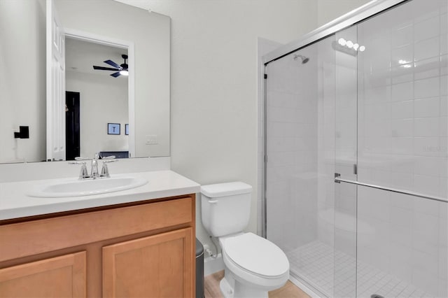 3850 Bonfire Dr, Odessa, FL 33556 - bathroom featuring a shower stall, toilet, and vanity