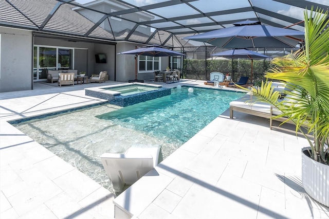 3850 Bonfire Dr, Odessa, FL 33556 - view of swimming pool with outdoor lounge area, a patio area, glass enclosure, and a pool with connected hot tub