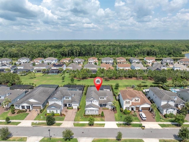 3850 Bonfire Dr, Odessa, FL 33556 - aerial view of residential area featuring a forest