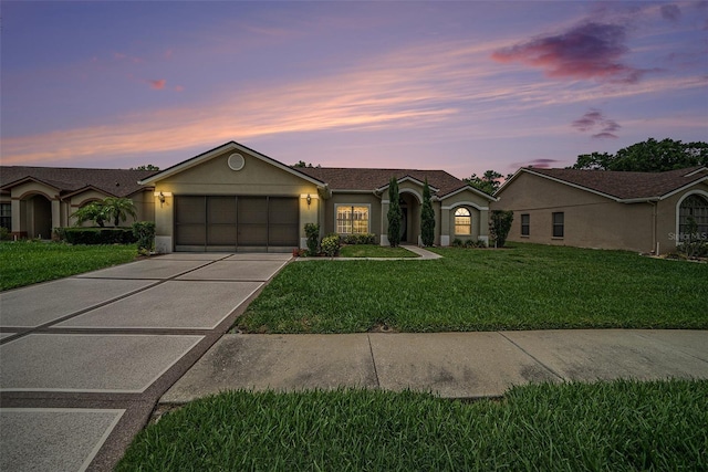 13819 Stoneridge Dr, Hudson, FL 34669 - ranch-style home with an attached garage, driveway, a yard, and stucco siding