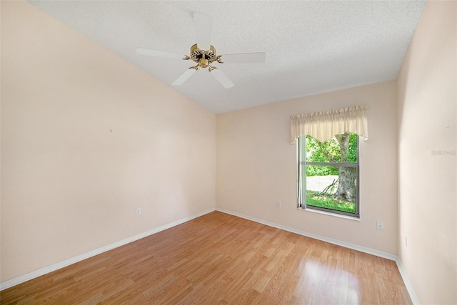 13819 Stoneridge Dr, Hudson, FL 34669 - unfurnished room with light wood-style flooring, baseboards, a textured ceiling, and a ceiling fan