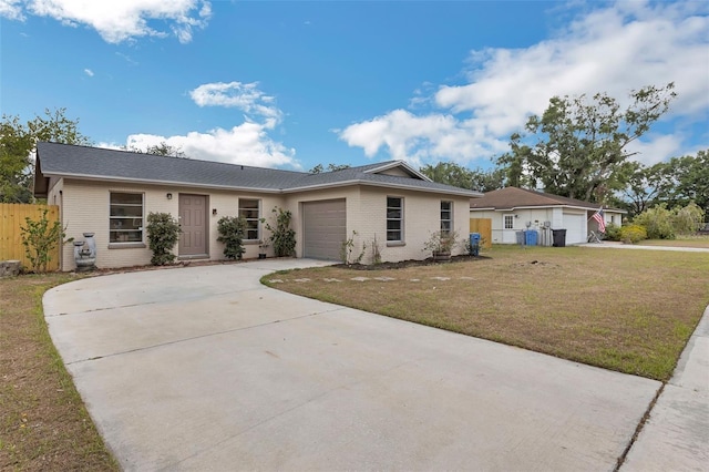 single story home with an attached garage, driveway, and brick siding